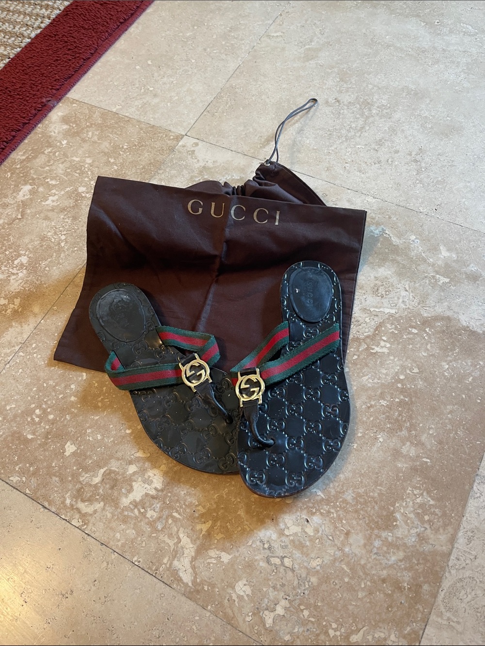 Gucci Women’s Black GG Flip Flops with Signature Web Strap